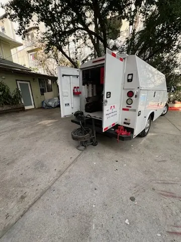 Magnet Plumbing service vehicle on-site for Grease Trap Cleaning in Voyager Village West